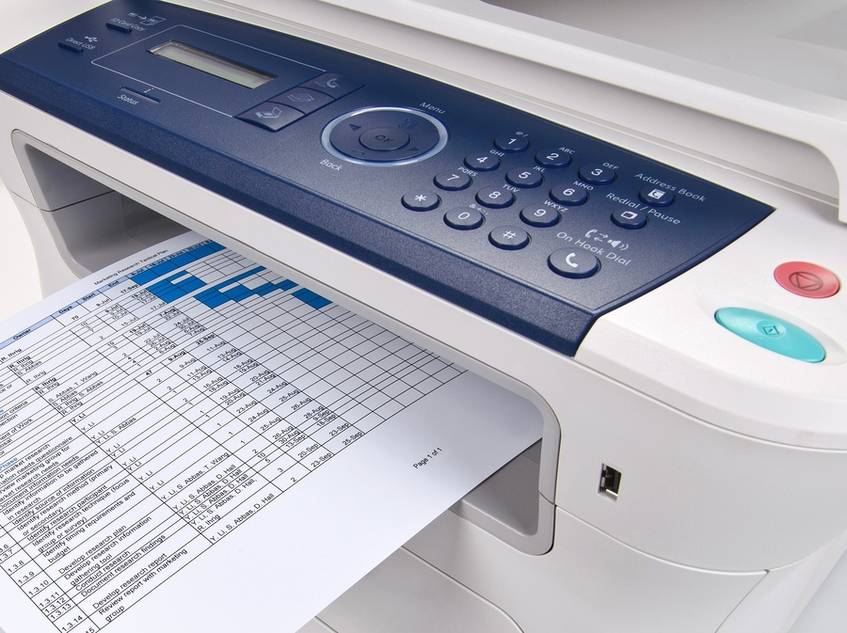 Printer printing out a spreadsheet document.